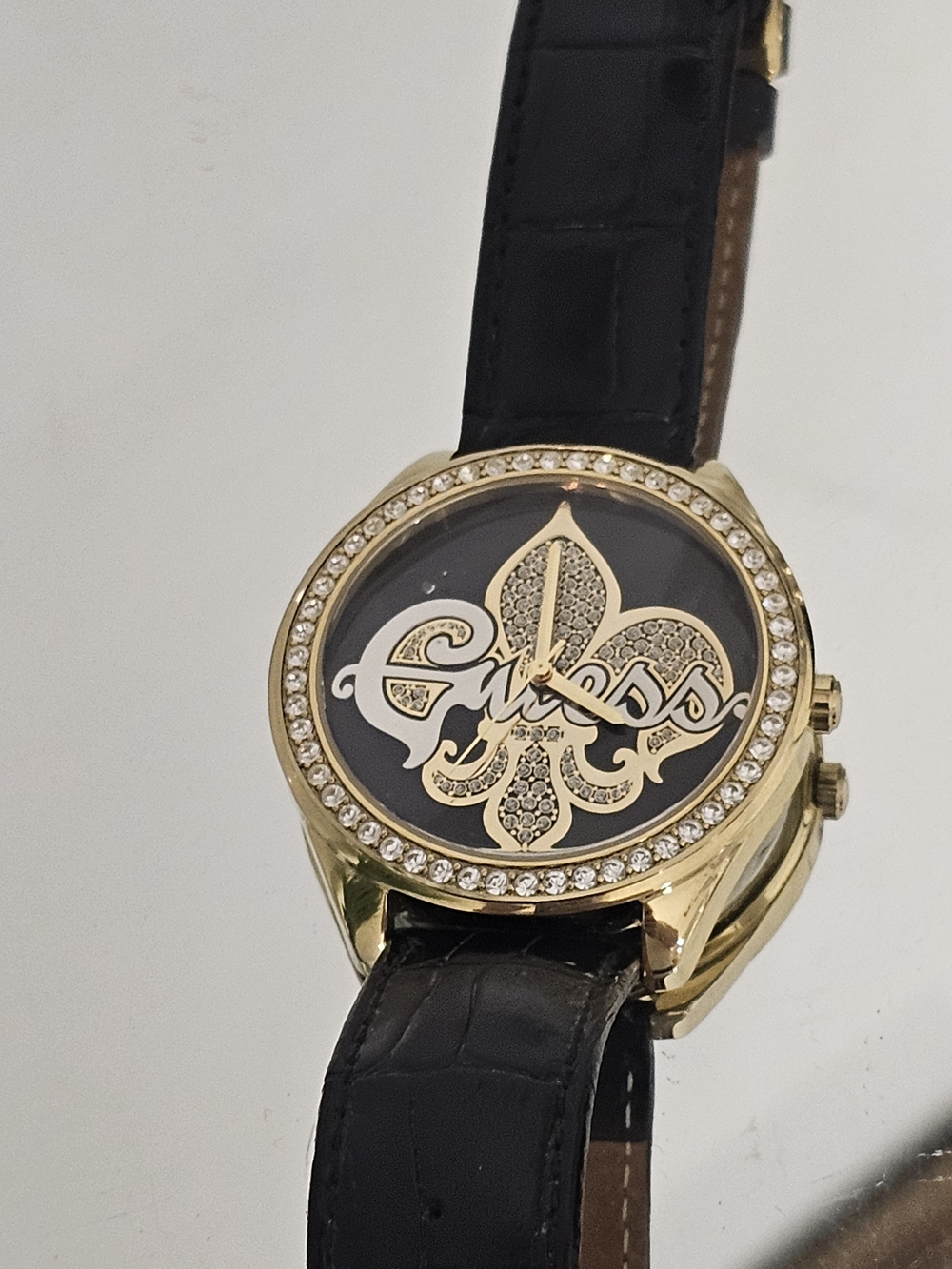 Guess Gold-Tone Crystal Accent Watch with Black Dial and Strap